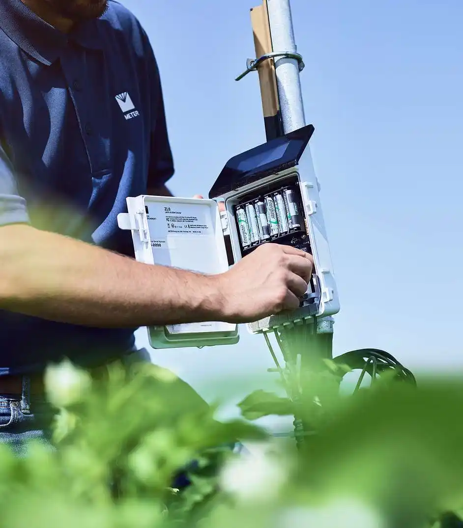 A METER research scientist connecting a sensor to a ZL6 data logger